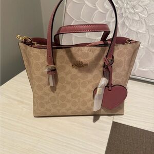 Coach Mollie Tote Bag 25 in Signature Canvas with Pink Heart Charm